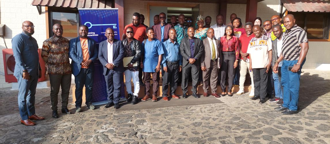 Cross section of participants posed for the press after the one-day session